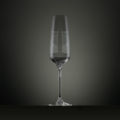 Engraved champagne flute showing the back detail of an illustration of the Ascot gates