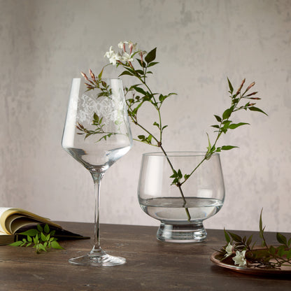 Engraved wine glass featuring gladioli, poppies and a comma butterfly in a wraparound composition