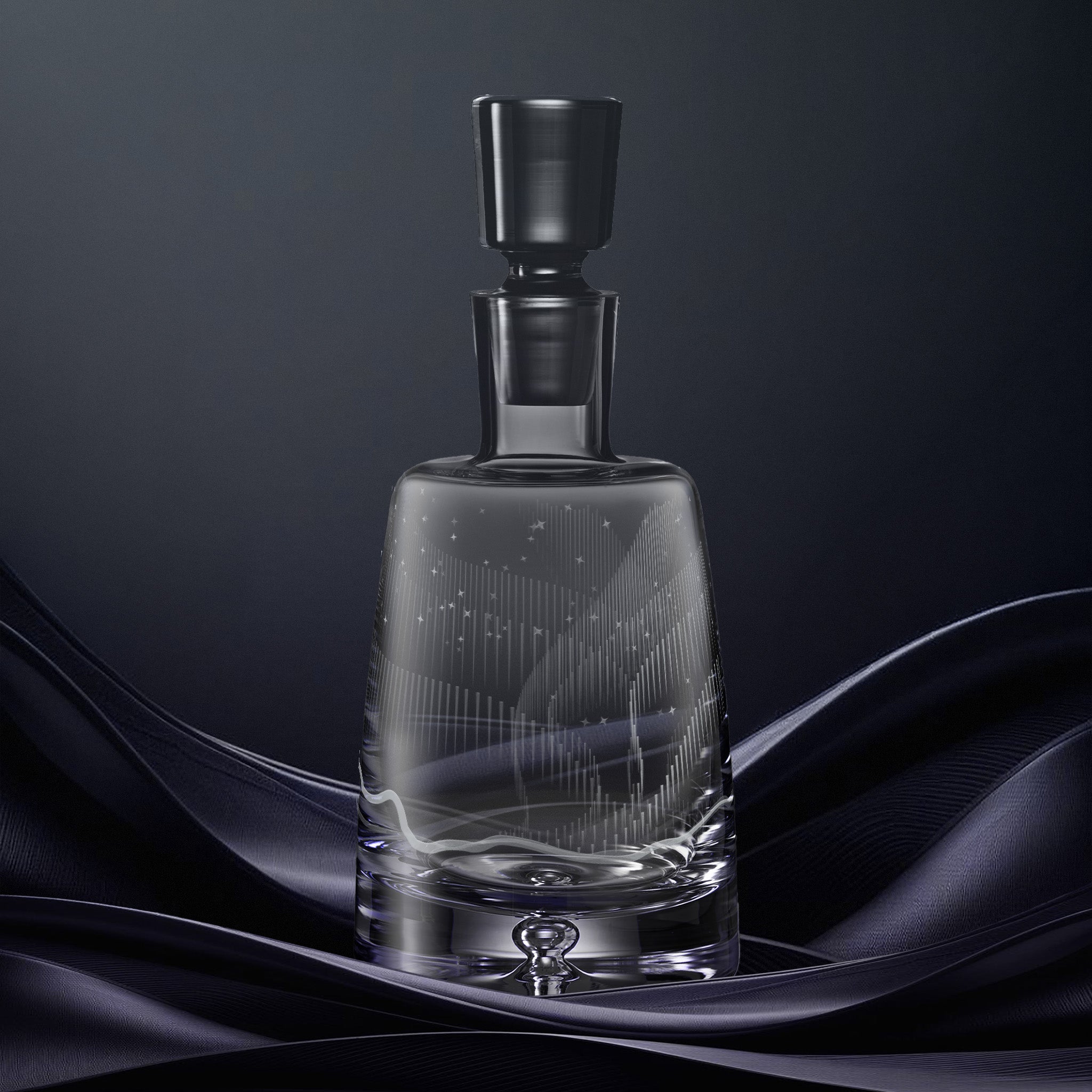 Engraved spirit decanter with an  illustration of the Aurora Borealis and stars