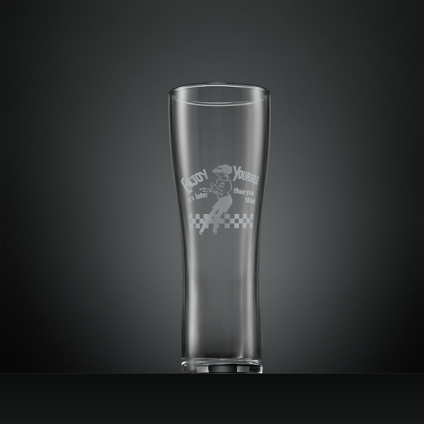 Engraved pint glass featuring a a dancing Beat Girl and the words Enjoy Yourself