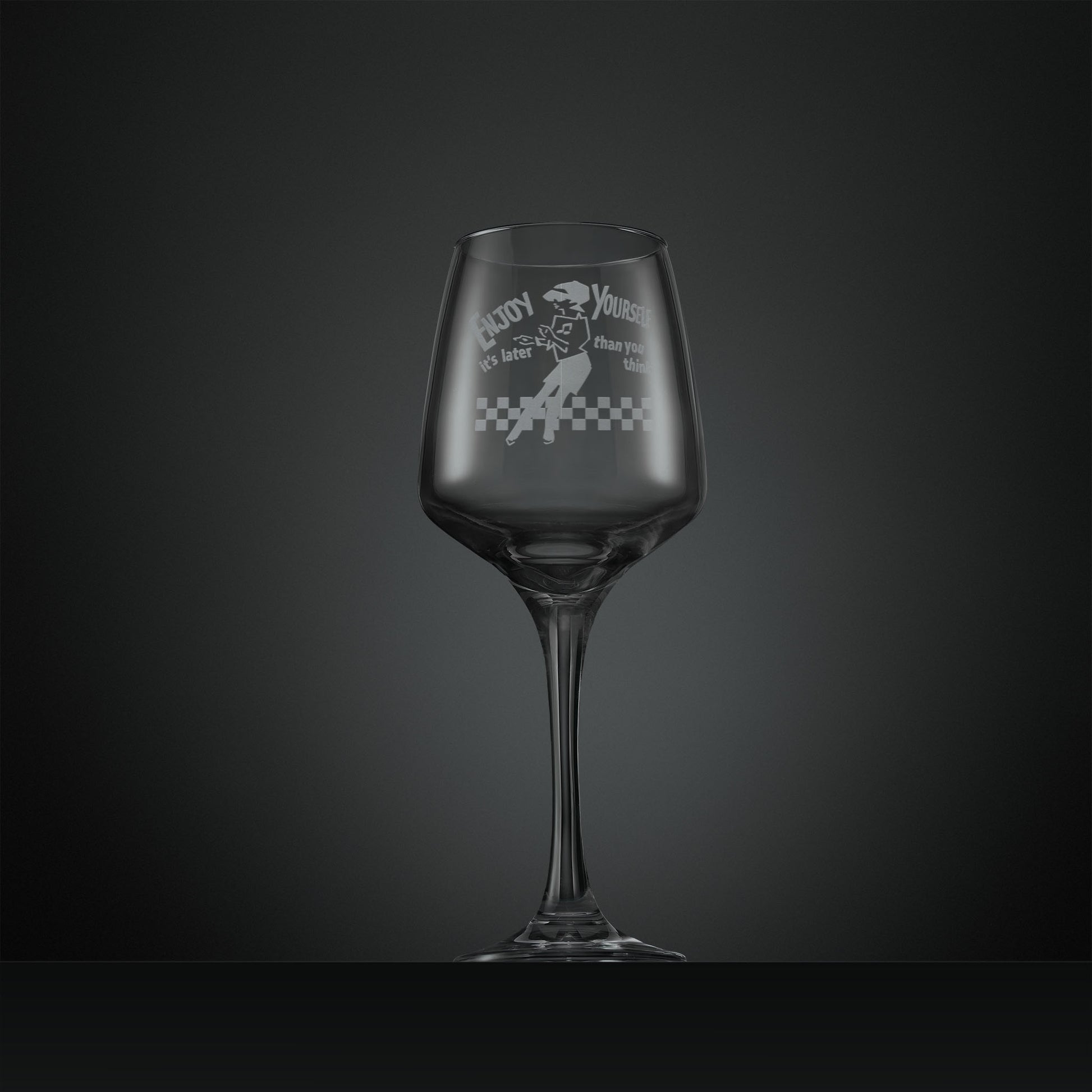Engraved wine glass featuring the Beat Girl dancing on a checkerboard floor
