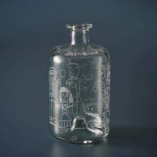 Apothecary style decanter engraved with grandchildren’s drawings of their granddad with child's handwritten messages