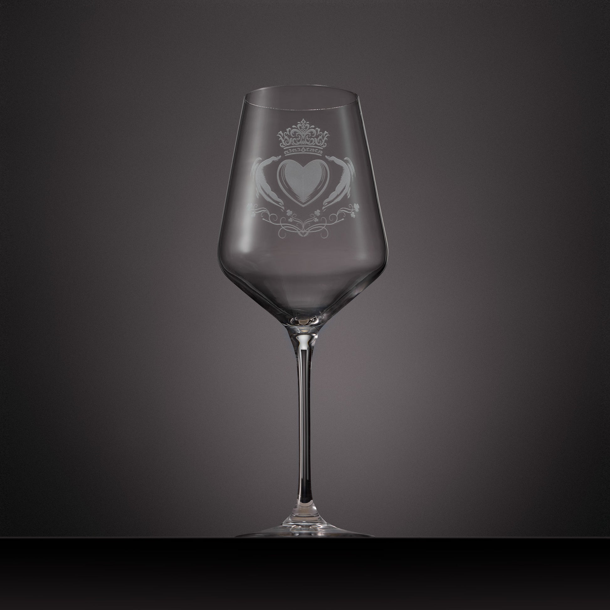 Engraved wine glass featuringa Claddagh design with shamrocks