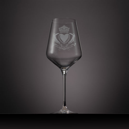 Engraved wine glass featuringa Claddagh design with shamrocks