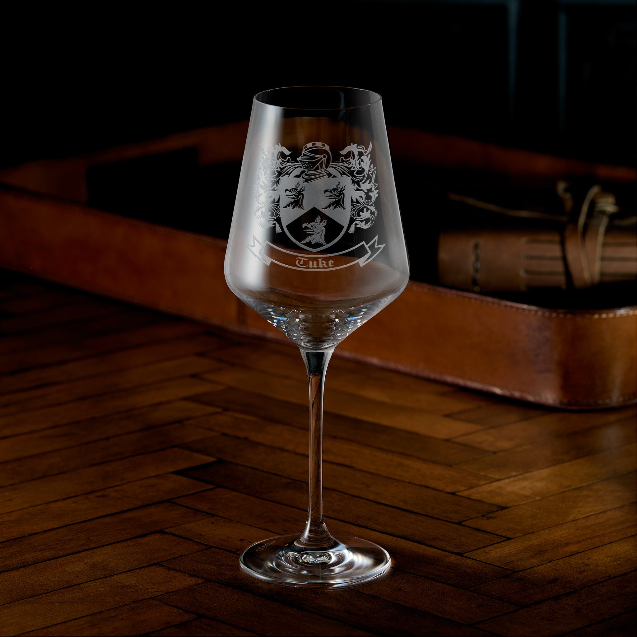 Engraved wine glass with coat of arms and family crest surname design