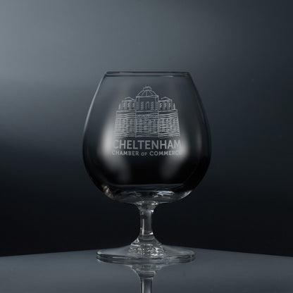 Engraved brandy glass featuring a corporate logo and personalised text