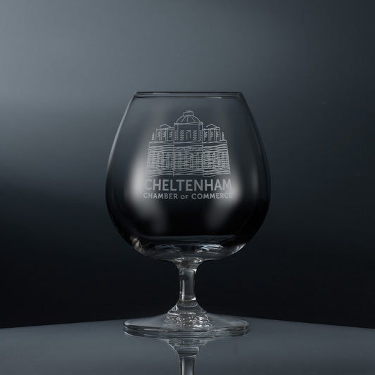 Engraved brandy glass featuring a corporate logo and personalised text