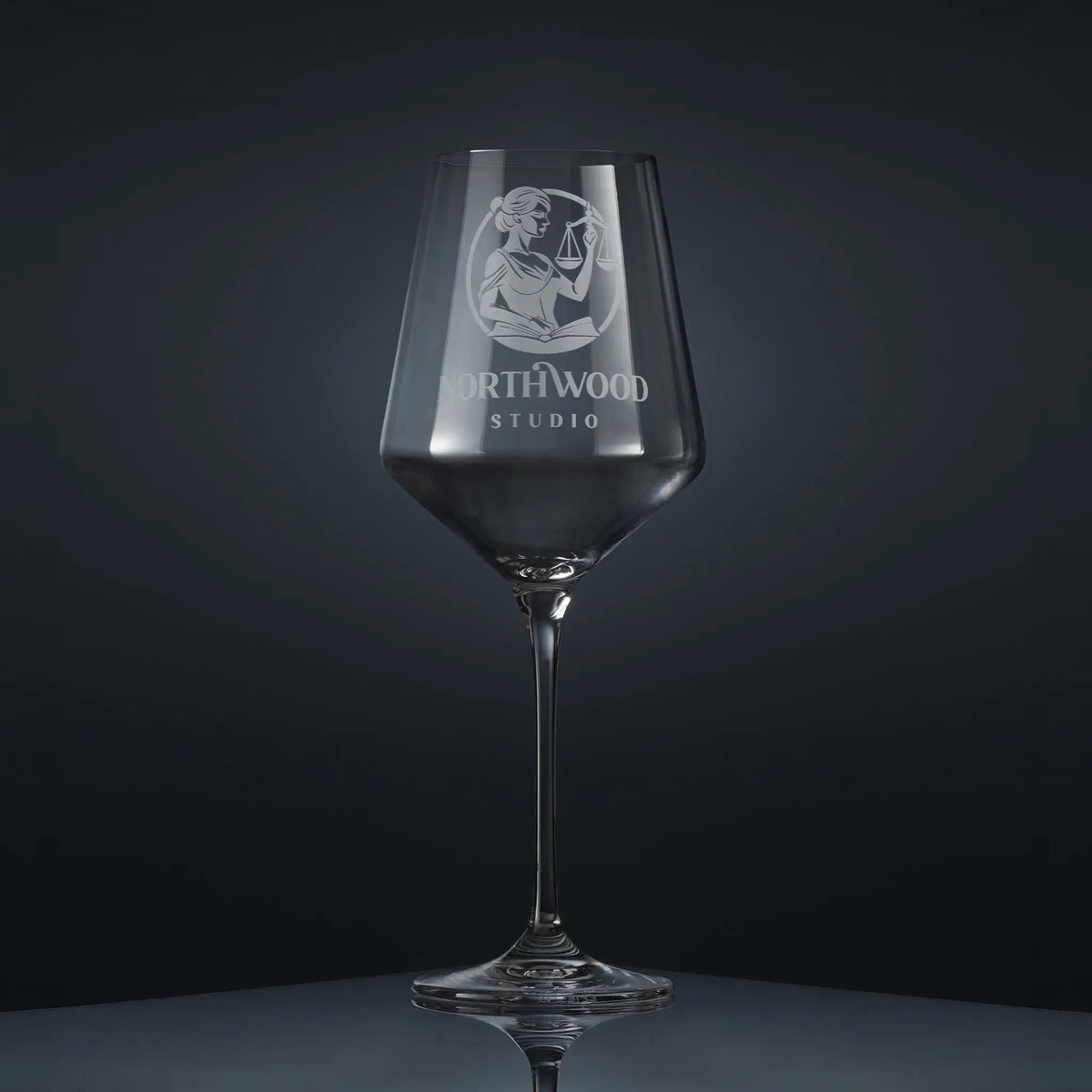 Bespoke engraved wine glass featuring a corporate branded logo and personalised text