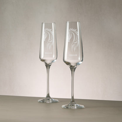Pair of bespoke engraved champagne flutes featuring a custom corporate logo.