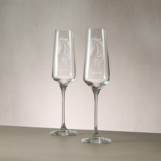 Pair of bespoke engraved champagne flutes featuring a custom corporate logo.