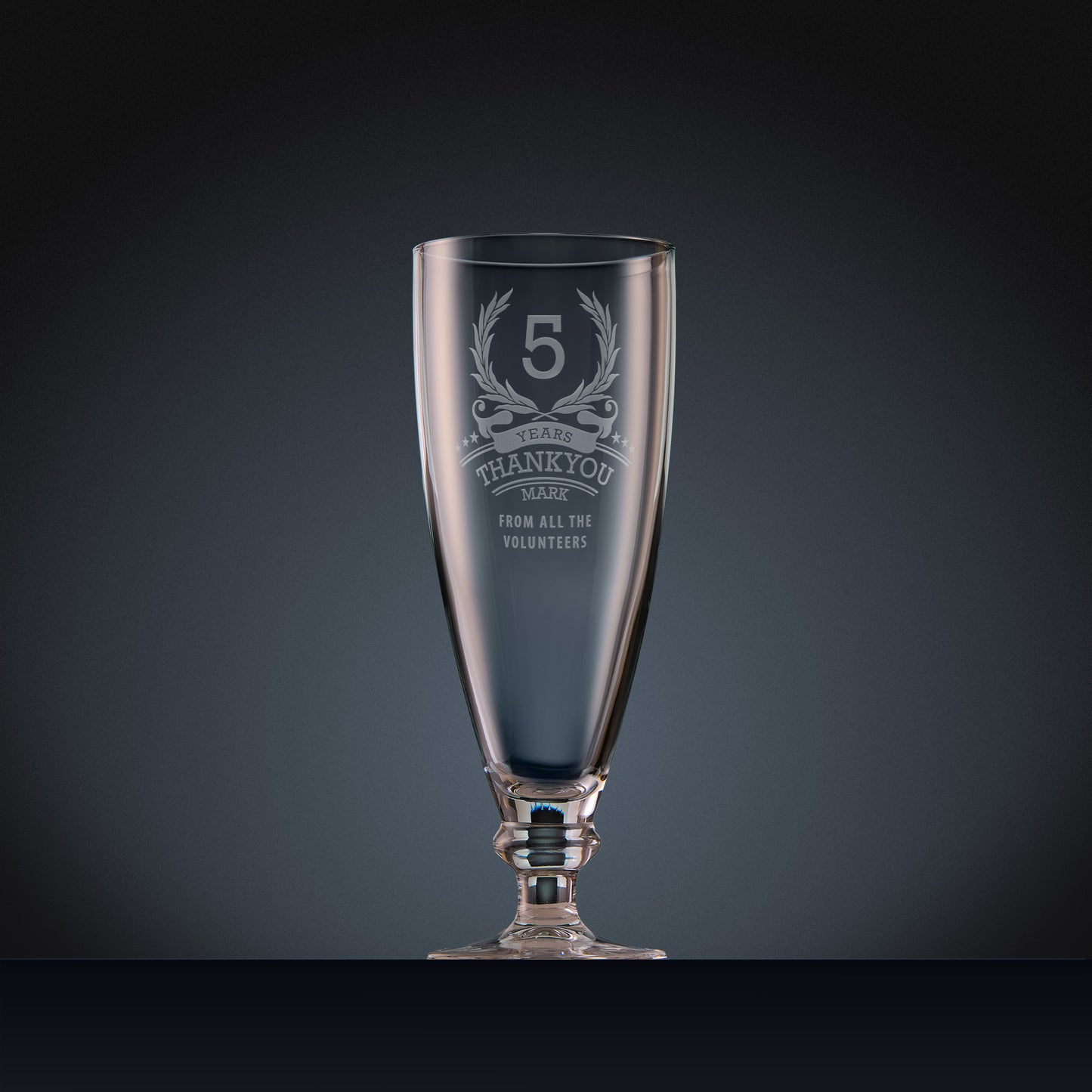 Engraved stemmed beer glass with laurel wreath anniversary design and personal message