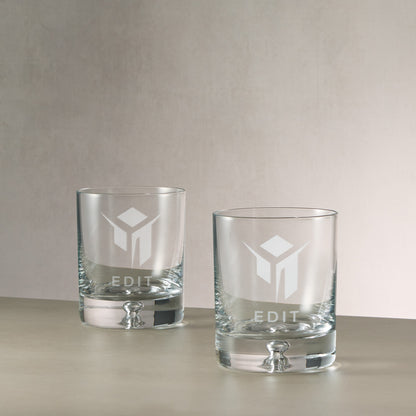 Pair of bespoke branded whisky glasses engraved with corporate logo