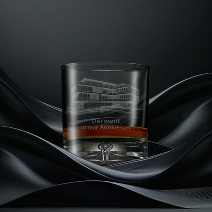 Engraved whisky glass with an  illustration of a corporate building and personalised inscription