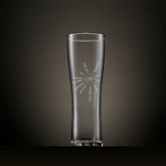 Engraved pint glass featuring a radial typography design of classic cricket batting strokes.