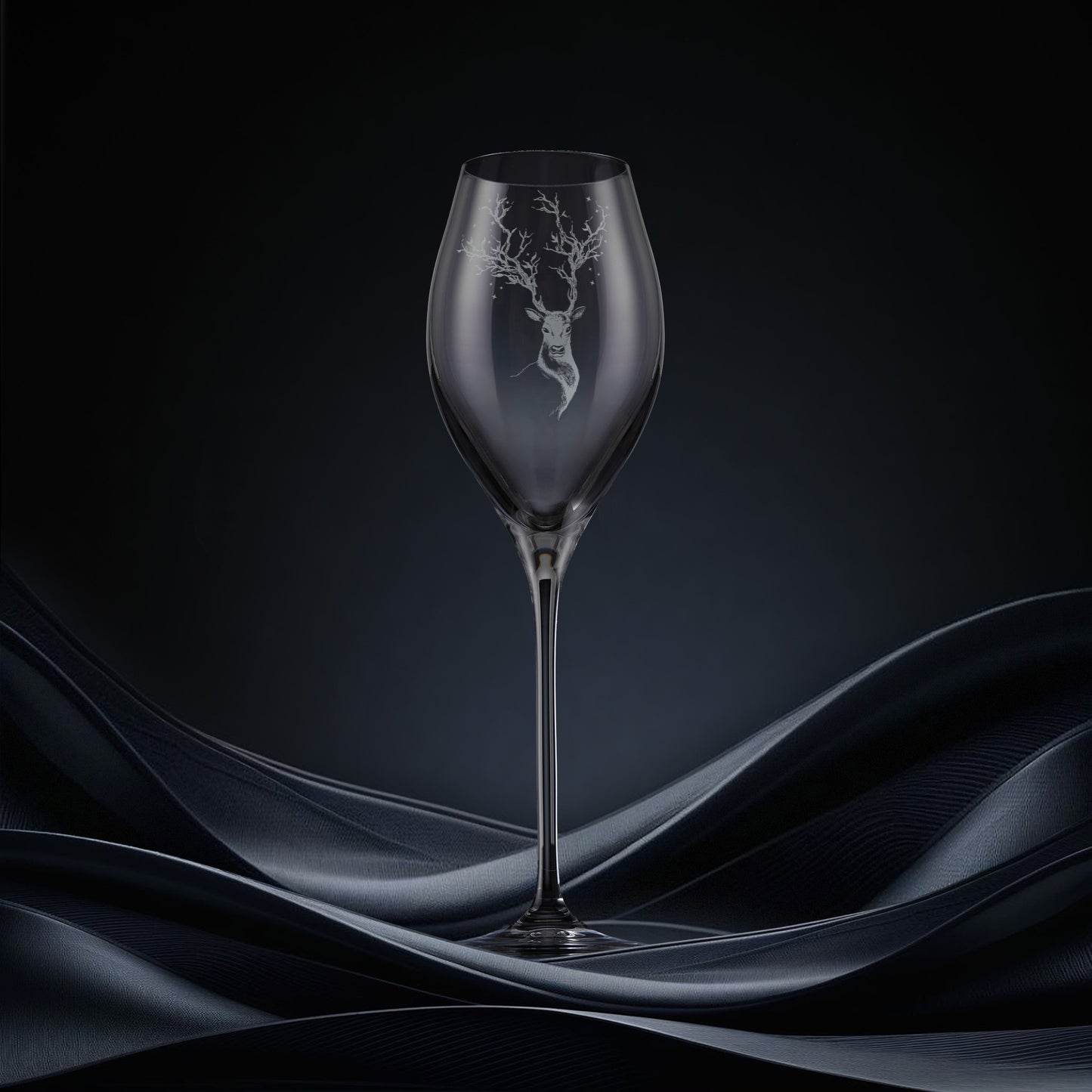 Engraved prosecco glass featuring a stag with branches and stars for antlers