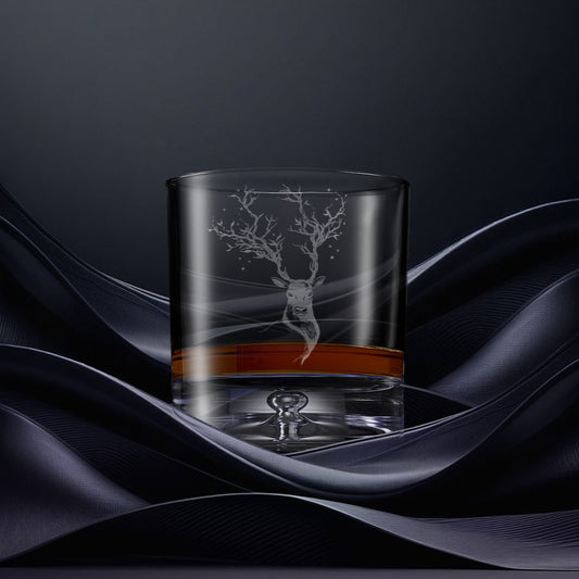 Engraved whisky glass with an  illustration of a deer with stars in her antlers