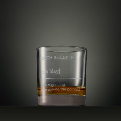Engraved whisky glass featuring a Four Morning Drams Gaelic inscription with explanatory text.