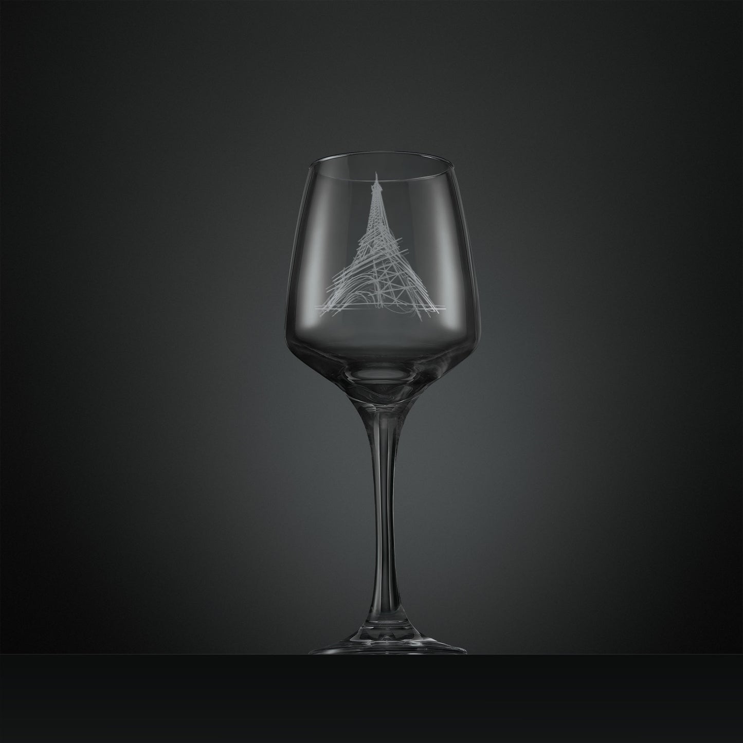 Engraved wine glass featuring an architectural study of the Eiffel Tower in Paris