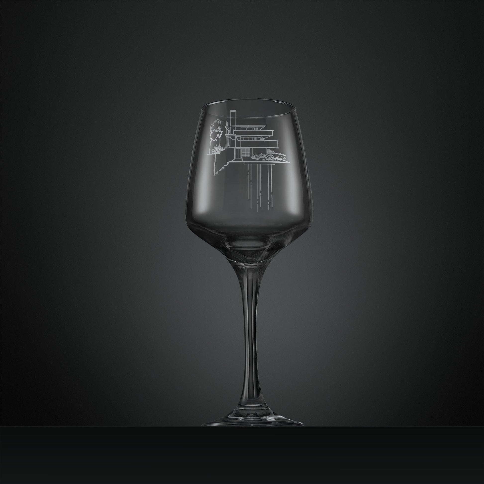 Engraved wine glass featuring an architectural study of Falling Water