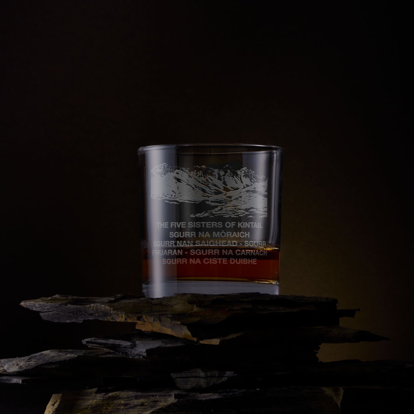 Engraved whisky glass with five sisters Kintail illustration