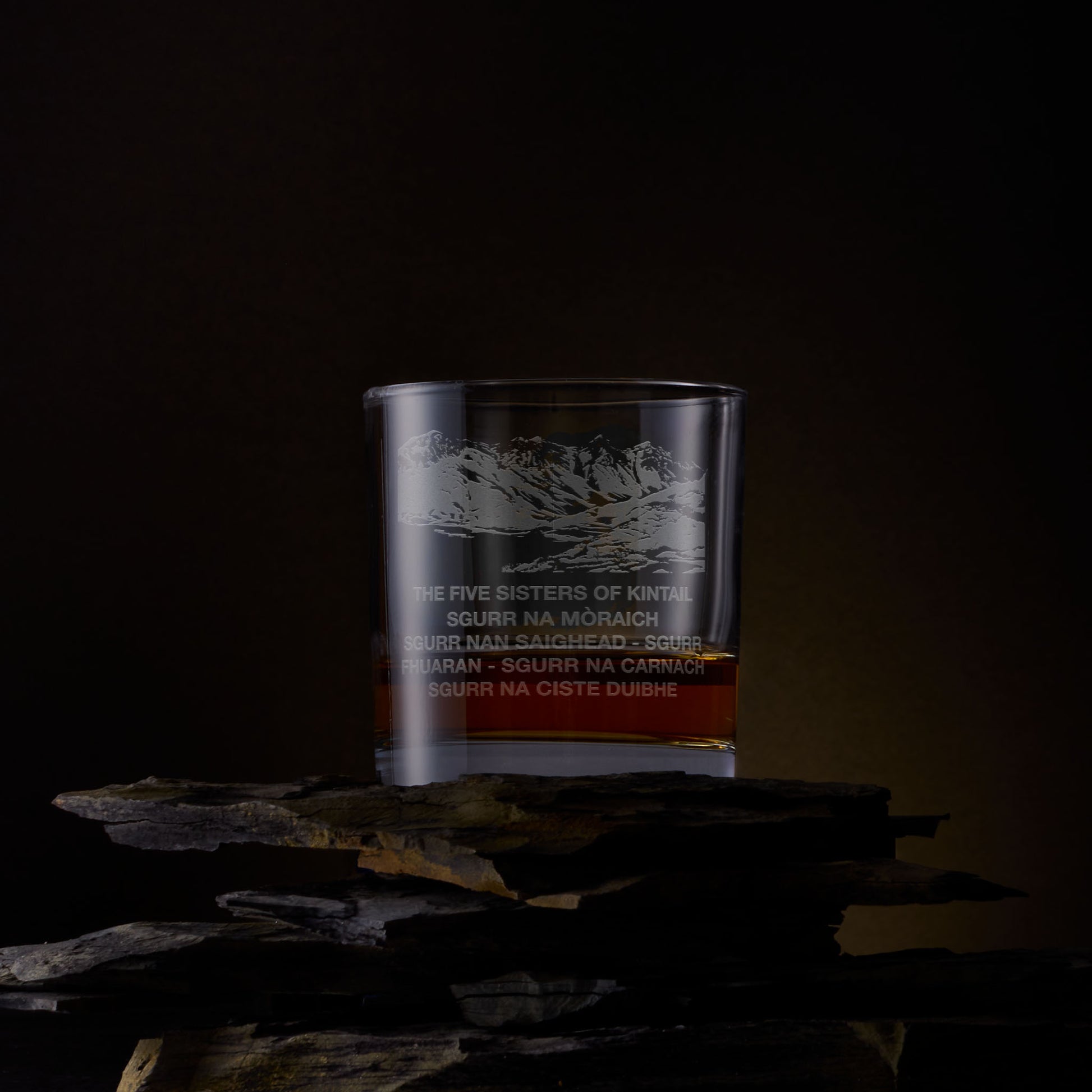 Engraved whisky glass with five sisters Kintail illustration