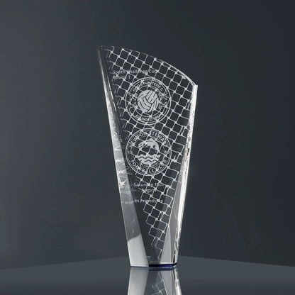 A modern optical crystal glass award engraved with football-themed graphics, team logos and personalised text