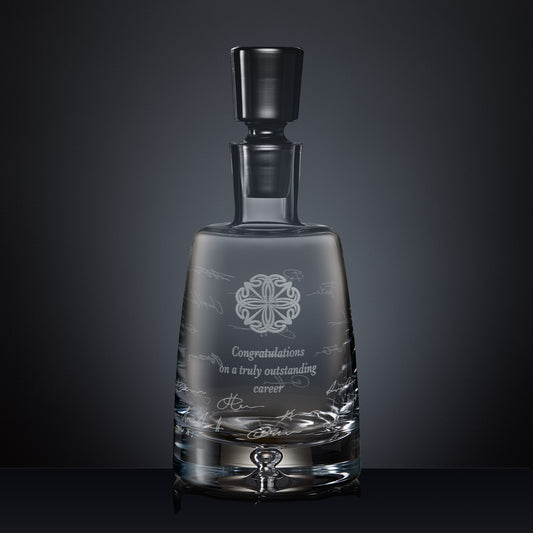 Engraved decanter with company logo and handwritten signatures in a wraparound design