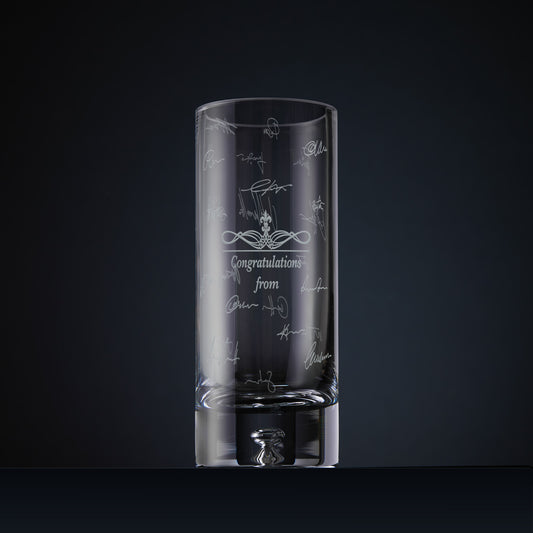 Engraved flower vase with several handwritten signatures in a wraparound design