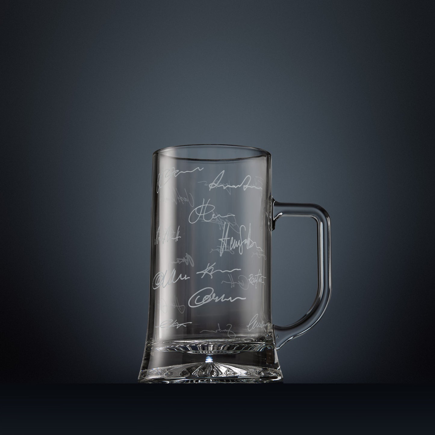 Engraved glass beer tankard with lots of handwritten signatures in a wraparound design