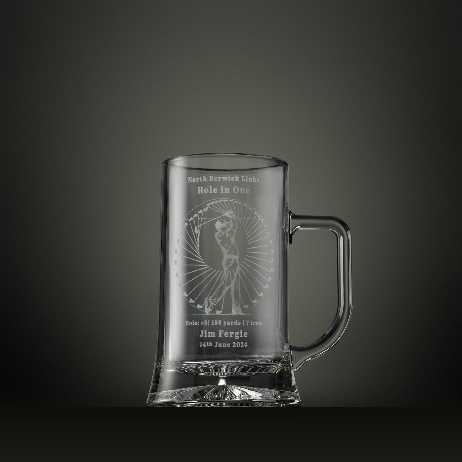 Engraved glass tankard featuring  a perfect golf swing design, personalised to commemorate a hole in one with course, hole number, yardage, club and date.