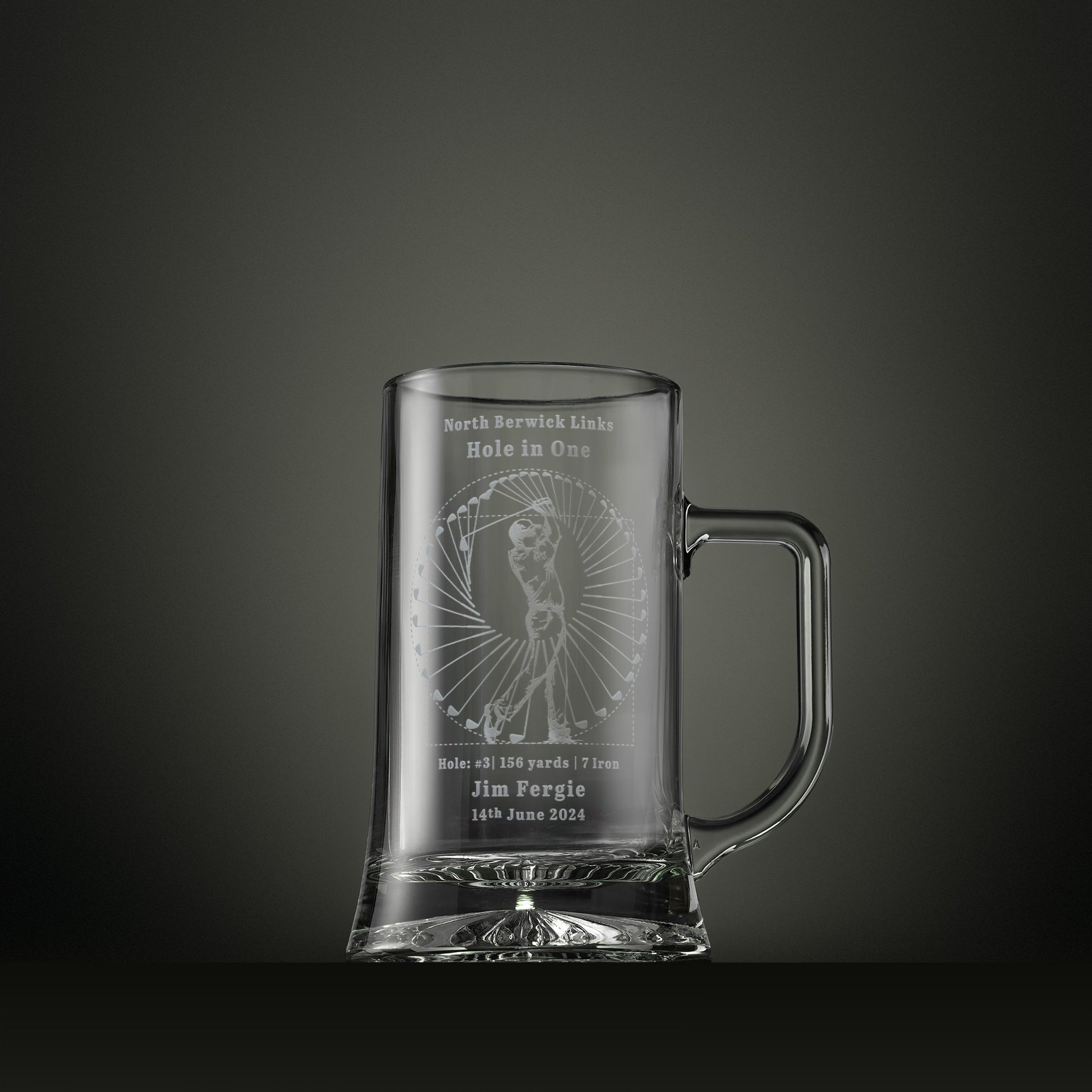 Engraved glass tankard featuring the Perfect Swing golf design, personalised to commemorate a hole in one with course, hole number, yardage, club and date.