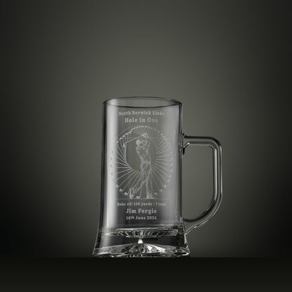 Engraved glass tankard featuring the Perfect Swing golf design, personalised to commemorate a hole in one with course, hole number, yardage, club and date.