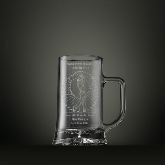 Engraved glass tankard featuring the Perfect Swing golf design, personalised to commemorate a hole in one with course, hole number, yardage, club and date.