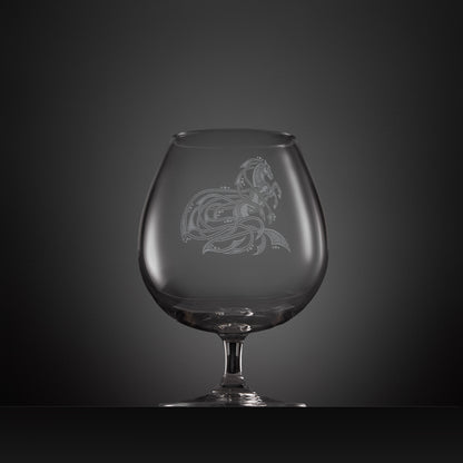 Engraved brandy glass with an  illustration of a horse entwined with Celtic knotwork