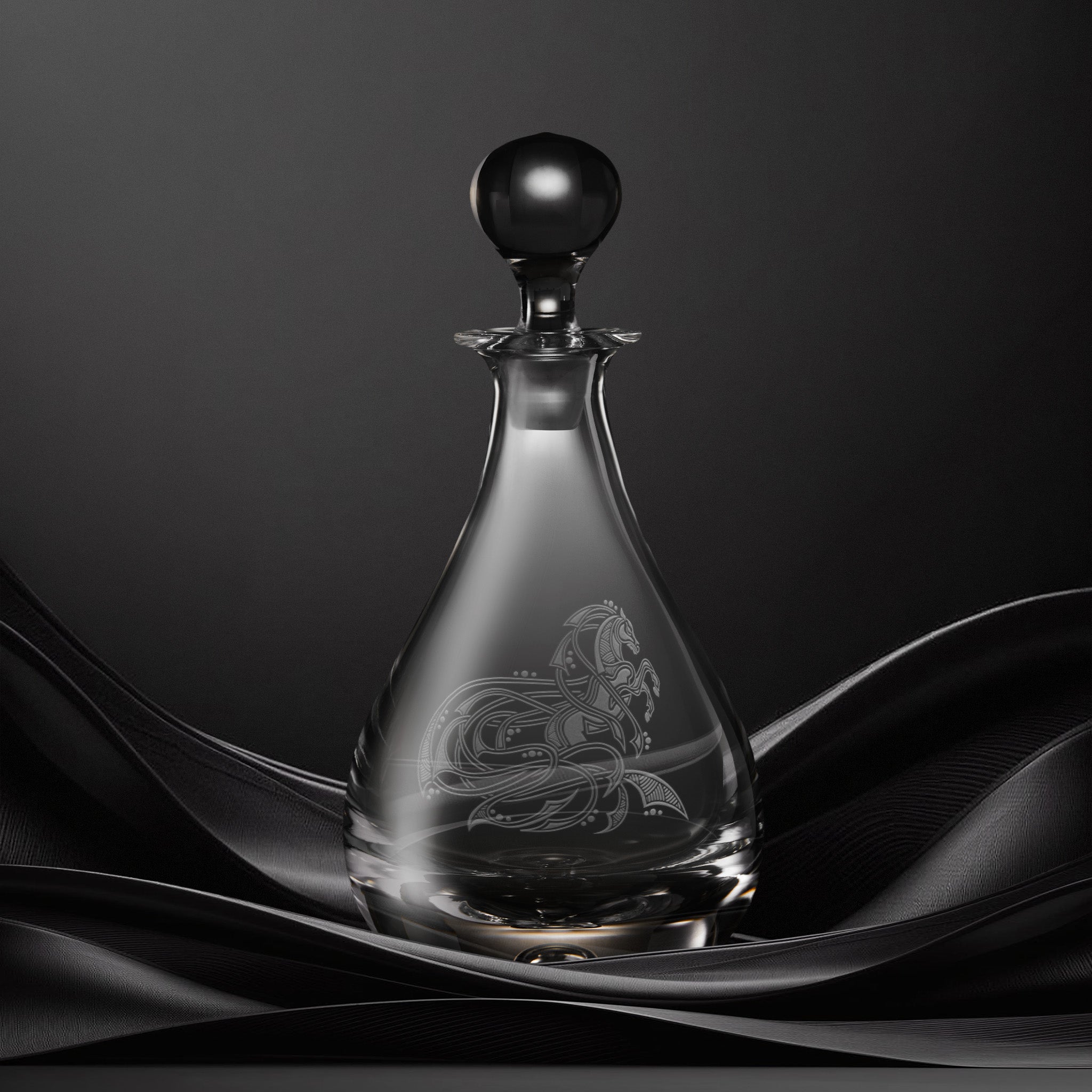 Engraved wine decanter with an  illustration of a horse with flowing Celtic knotwork