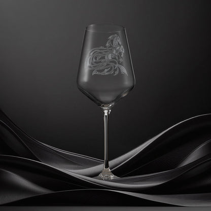 Engraved wine glass with an  illustration of a horse with flowing Celtic knotwork