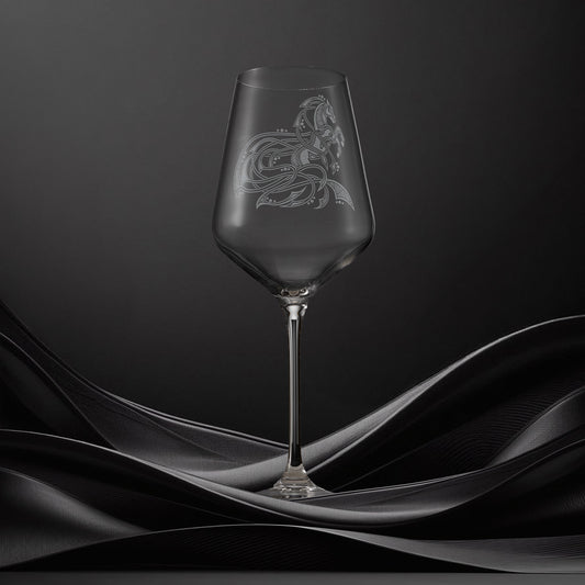 Engraved wine glass with an  illustration of a horse with flowing Celtic knotwork