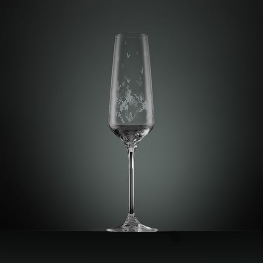 Engraved wraparound garland featuring garden birds, butterflies and blossom on a champagne flute