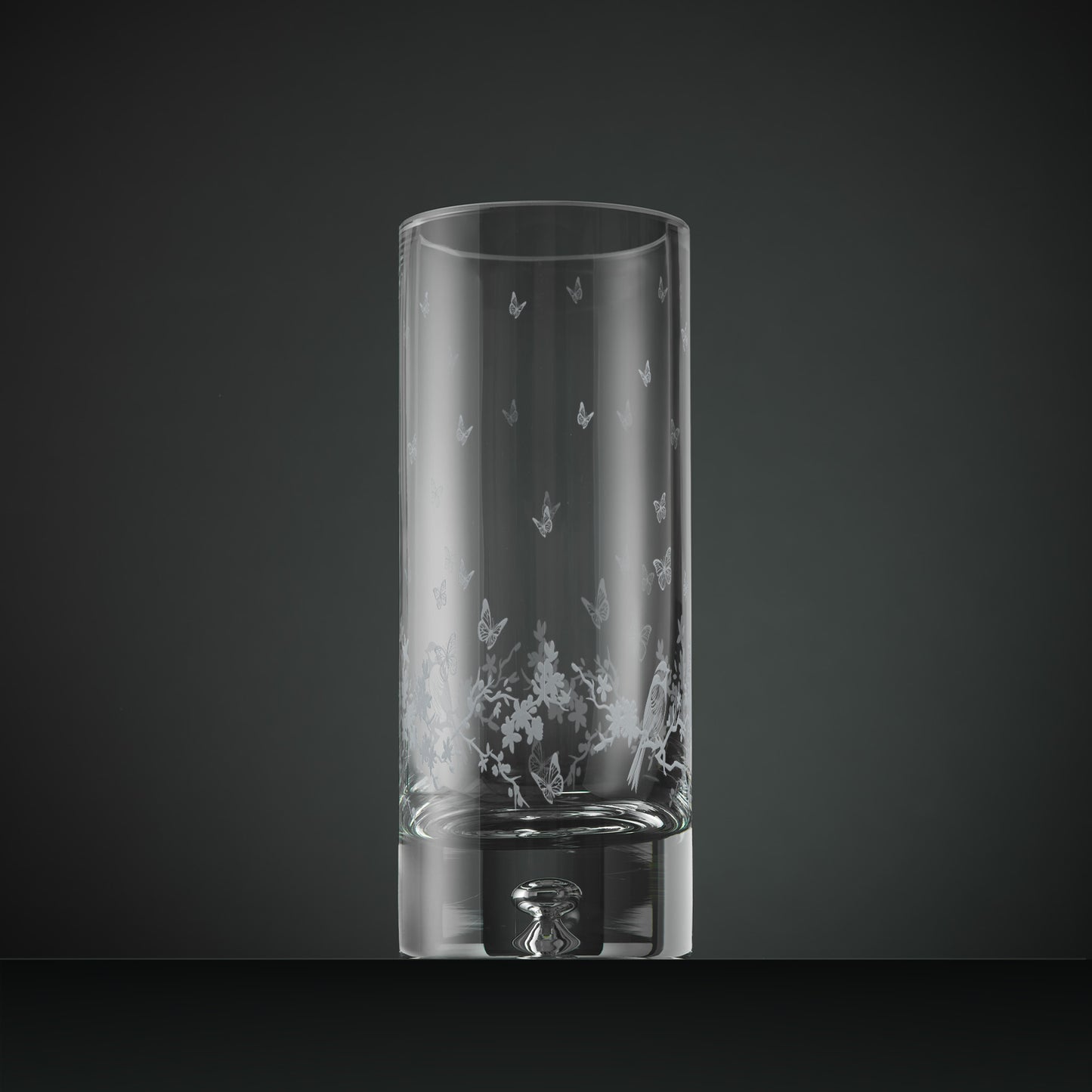 Engraved table vase with a blossom, butterflies and garden birds gathered in a garland design