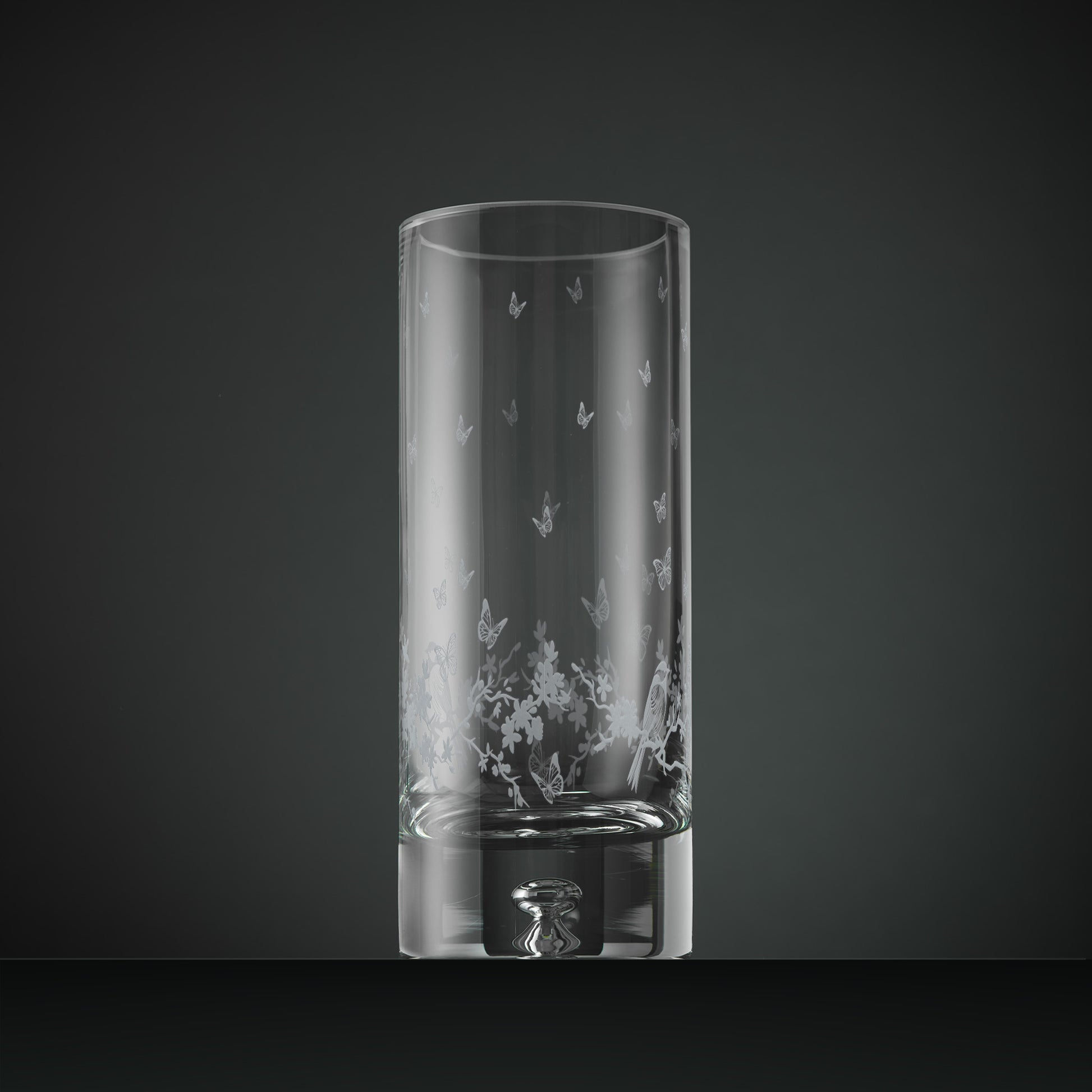 Engraved table vase with a blossom, butterflies and garden birds gathered in a garland design
