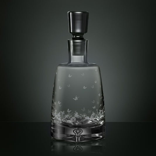 Engraved spirit decanter featuring garden birds, butterflies and blossom