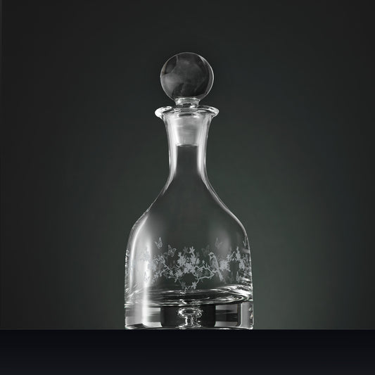 Handmade wine decanter featuring engraved garden birds, blossom and butterflies in a wraparound design