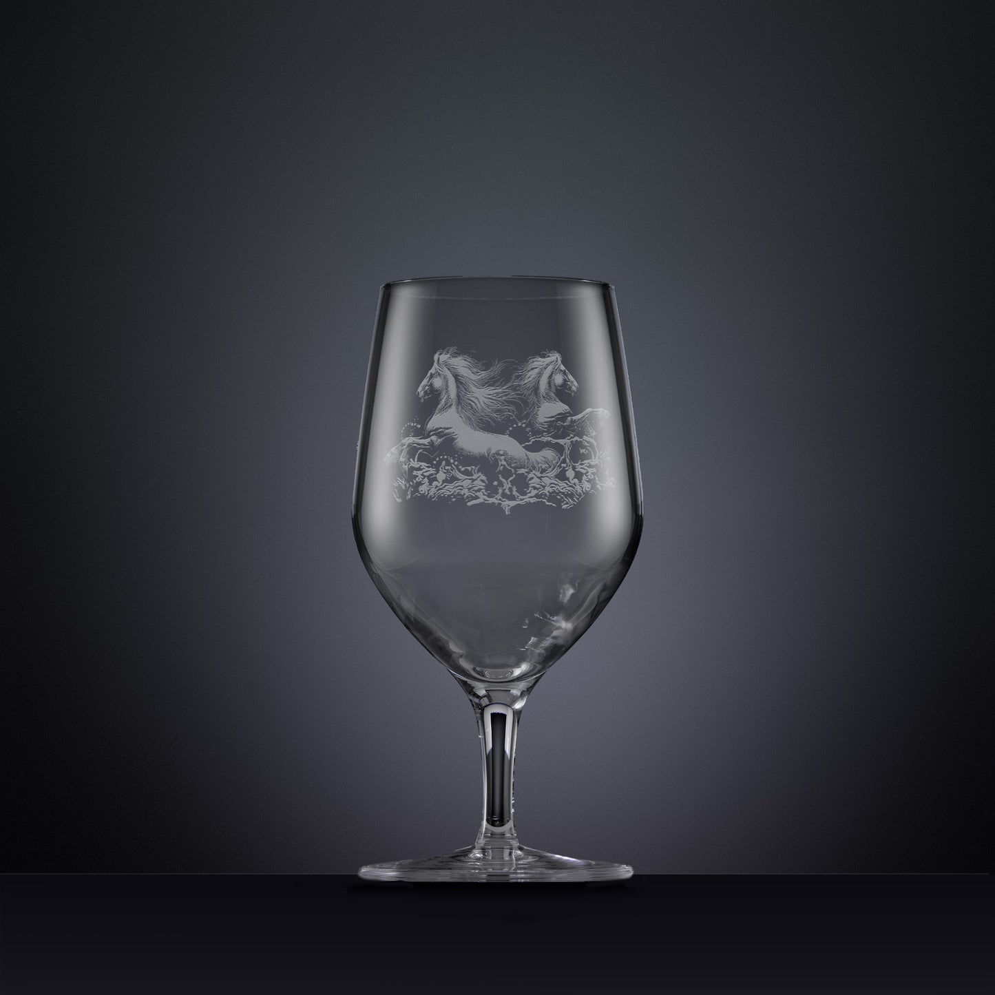 Engraved wine glass with an  illustration of two horses galloping through the water
