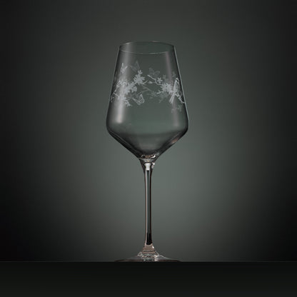 Hand engraved wine glass with floral, birds and butterflies illustration