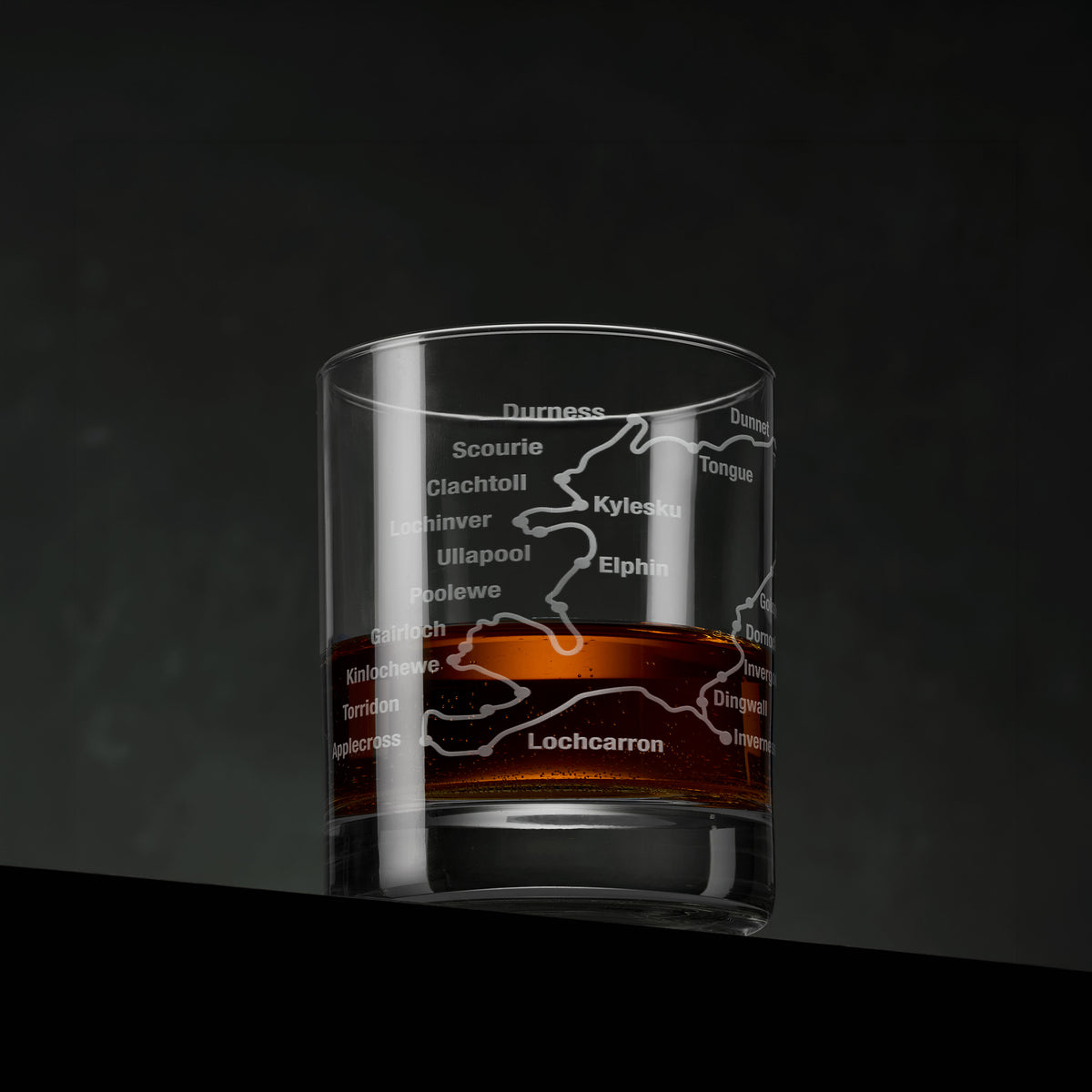 NC500 engraved whisky glass showing the route through Inverness, Dornoch, Wick and the north coast of Scotland