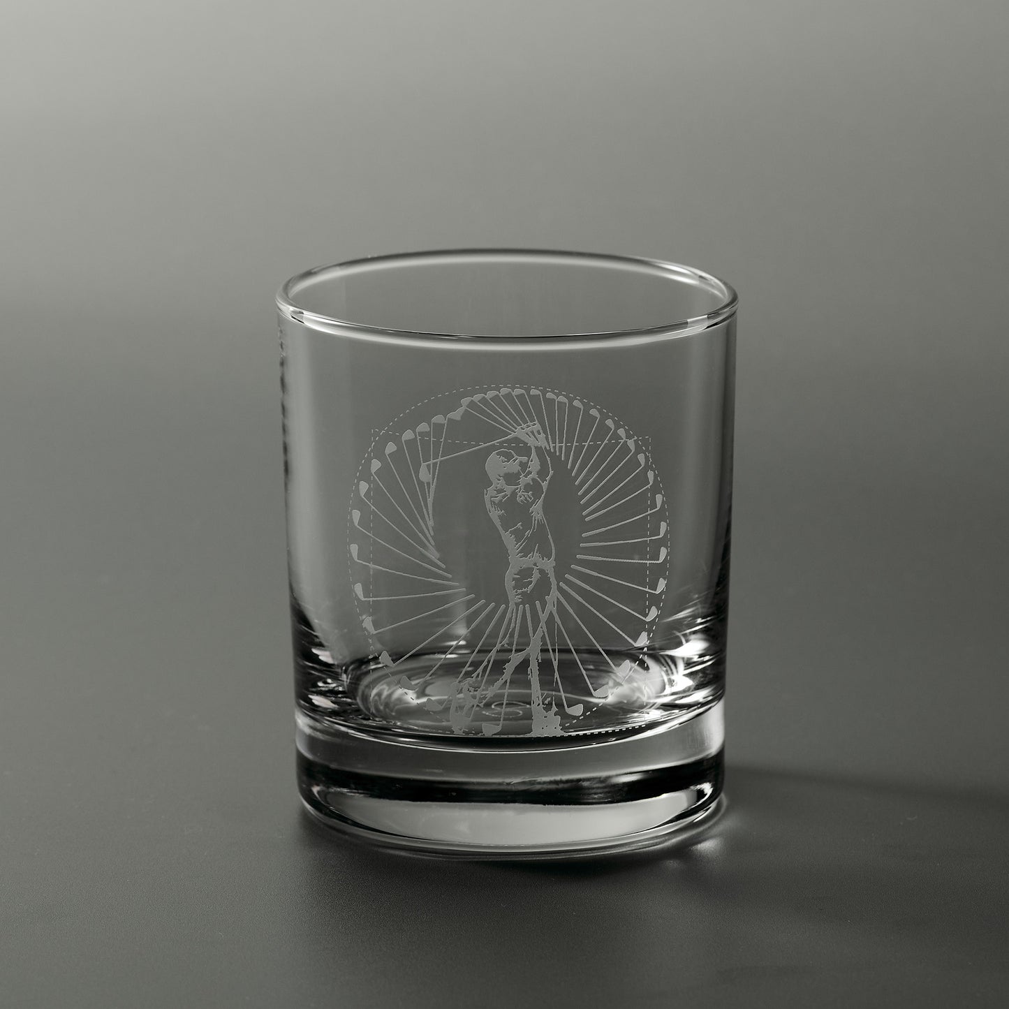 Engraved whisky glass featuring a male golfer performing a perfect swing