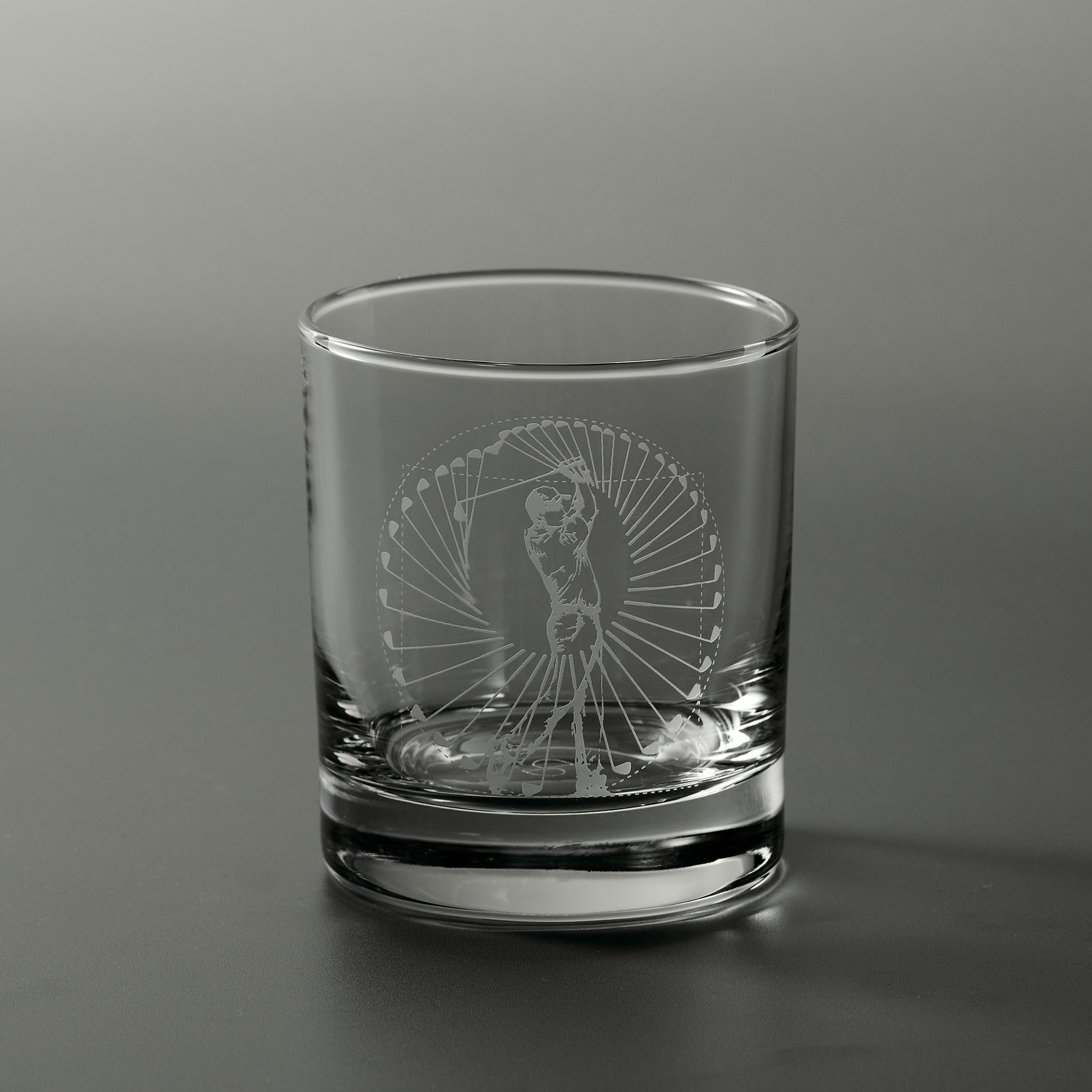 Engraved whisky glass featuring a male golfer performing a perfect swing