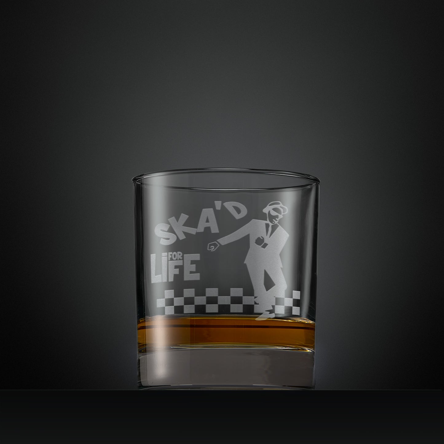 Engraved whisky glass featuring a ska man with the words SKA'd for life