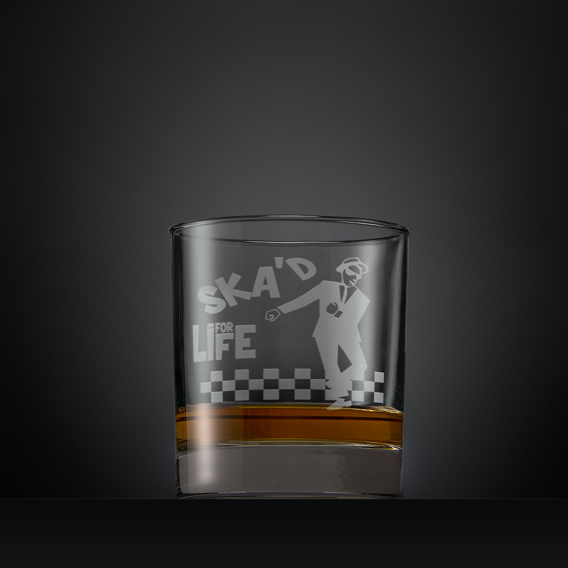 Engraved whisky glass featuring a ska man with the words SKA'd for life