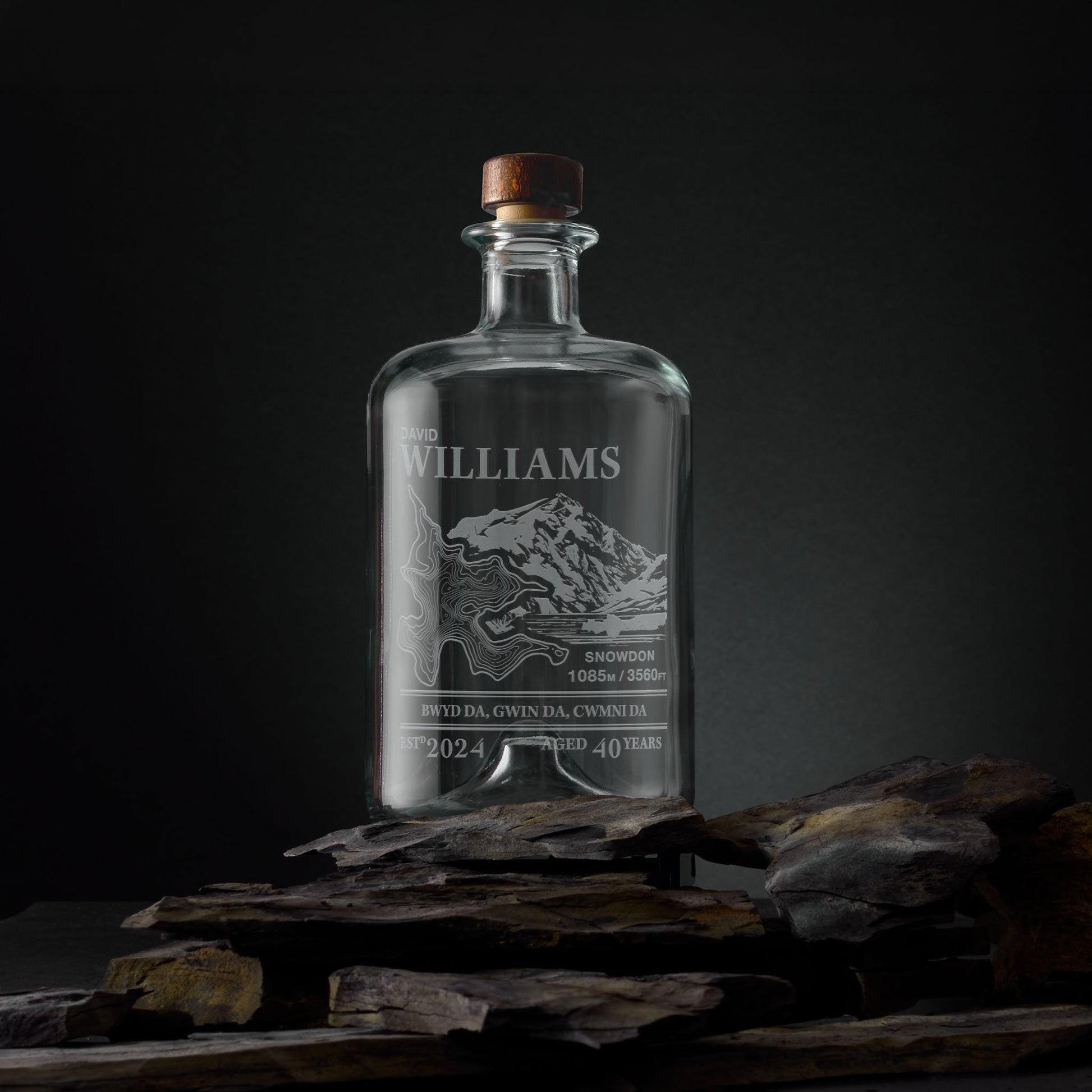 Engraved apothecary-style decanter with Snowdon illustration and topographic map